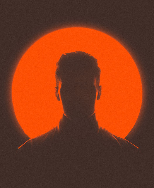 Dark silhouette profile of a man centered against a vibrant, glowing orange circle background for a team member directory page placeholder.