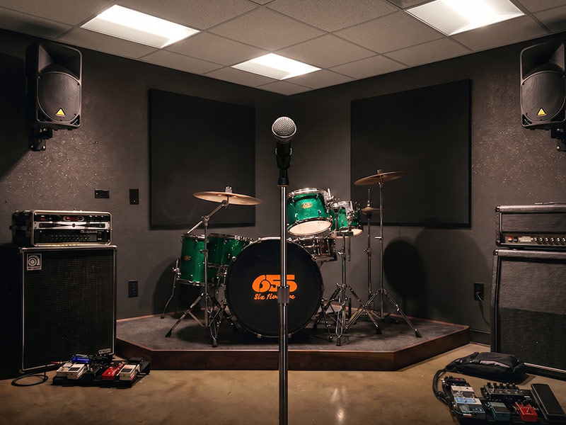 Clean interior layout shot of the fully equipped Small Room rehearsal space at 655 Studios.